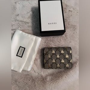 Gucci supreme bee canvas bifold wallet